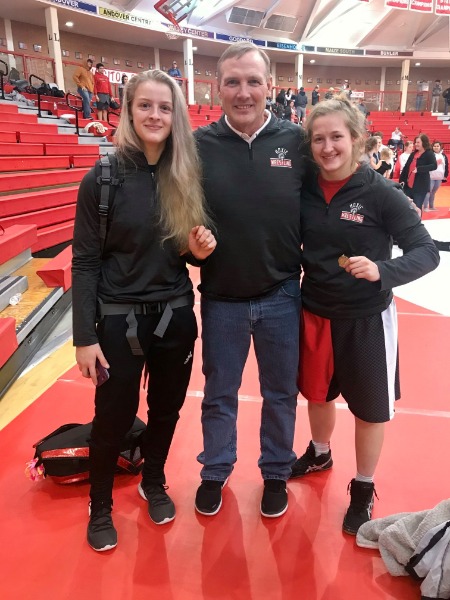 Girl wrestlers and coach